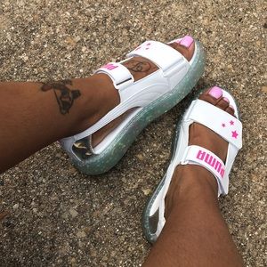 Puma sandals.